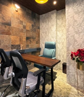 Stylish 3 seater private cabin with a wooden desk,"